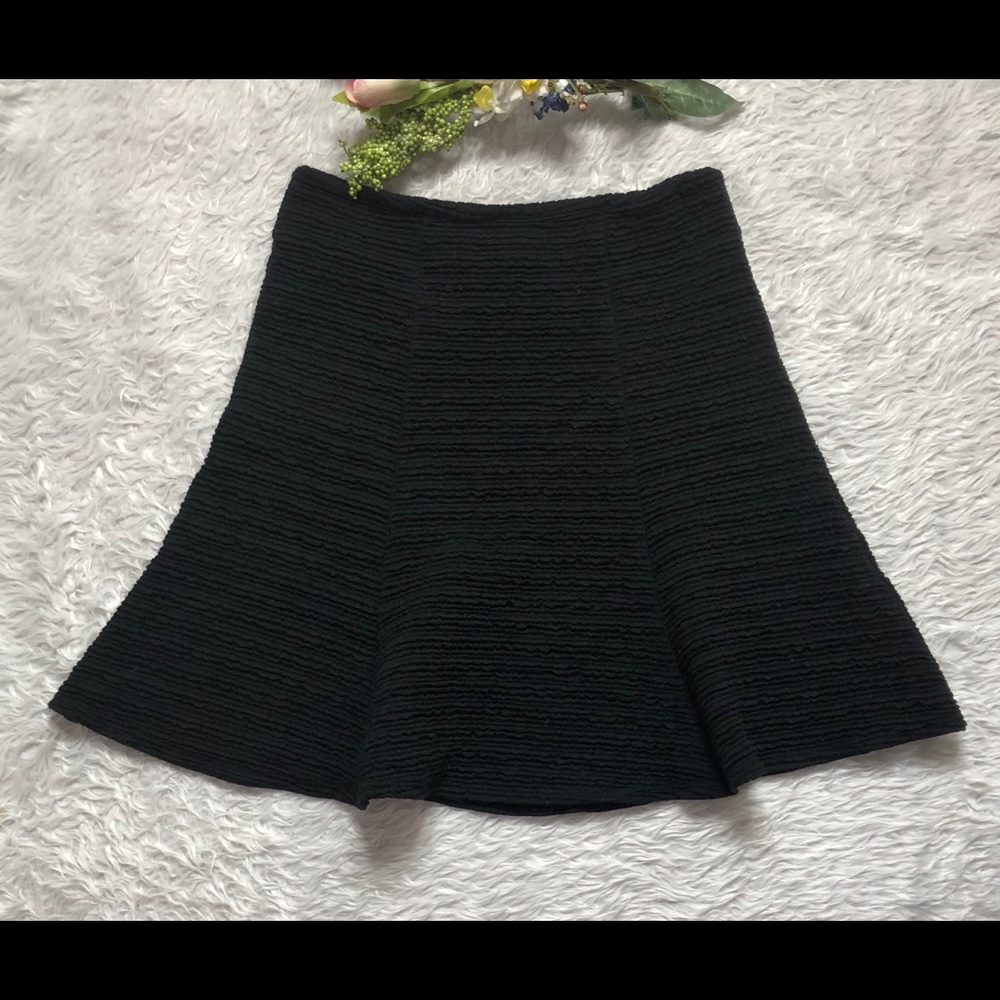 Anthropologie Mauve woman flare skit size Small